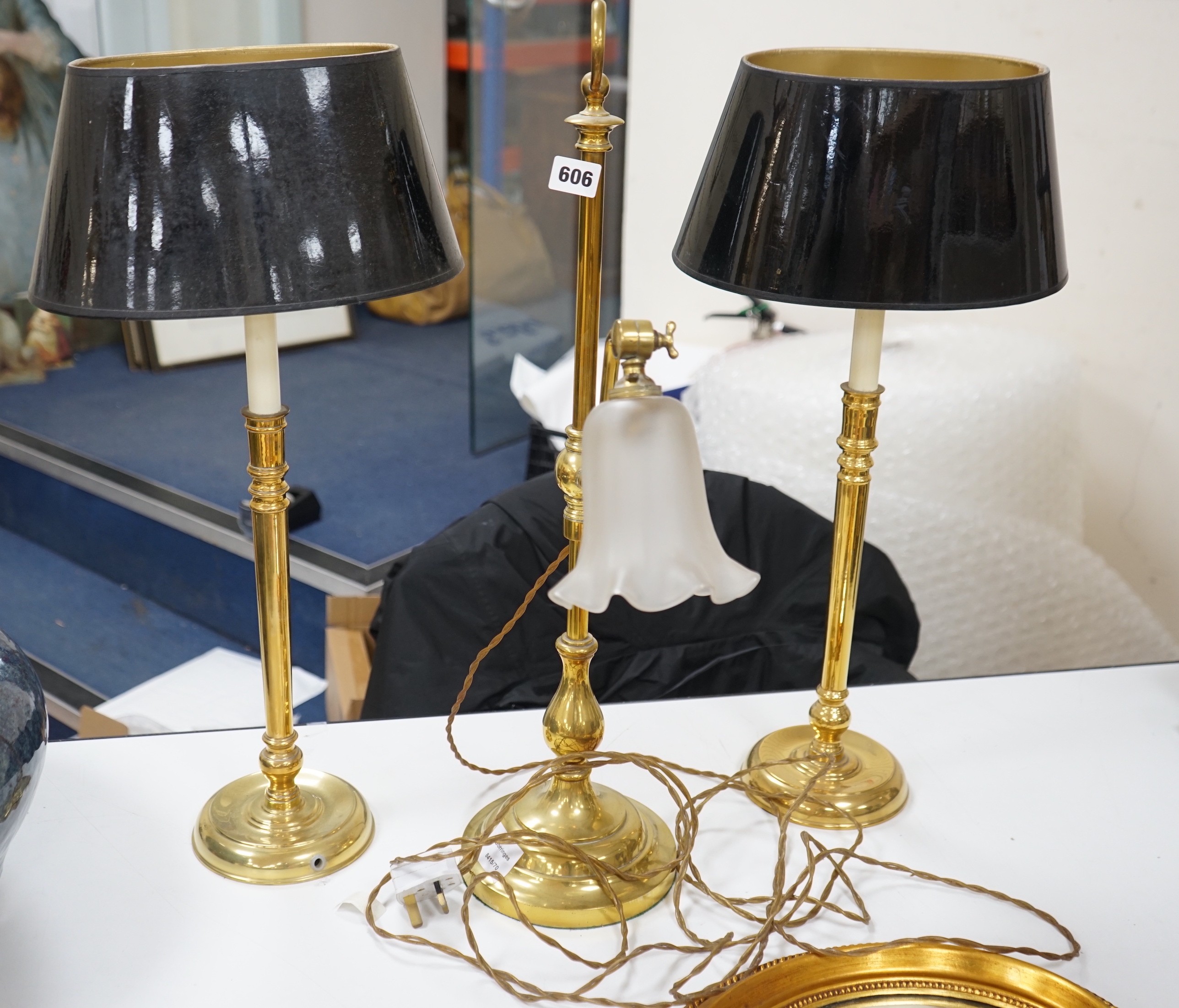 A pair of brass table lamps and another with glass shade (3)